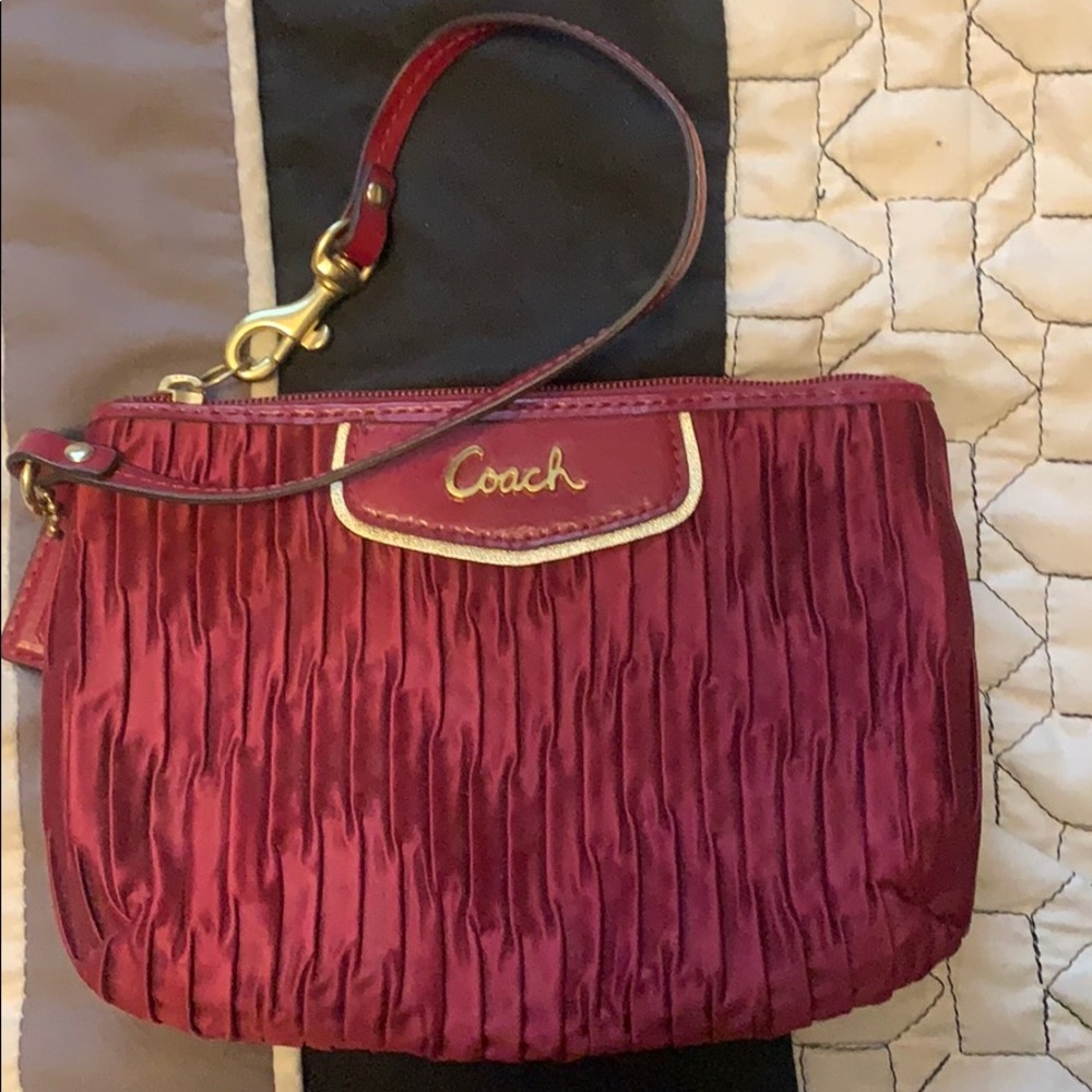 Authentic Coach wristlet dark red